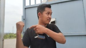 Petugas Security PT PMT. Dok (Nurlan) 