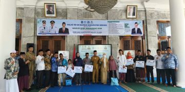 Rayakan Milad ke-26, Baznas Kabupaten Serang Salurkan Berbagai Jenis Bantuan kepada Mustahik. Dok (Nurlan)